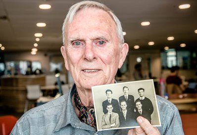 Ray Jones points to himself as he was 60 years ago