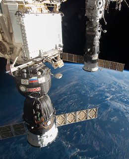 Soyuz space station with Earth below