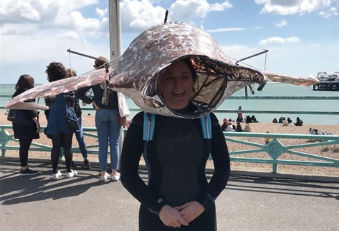 Annabel wearing her Manta Ray puppet