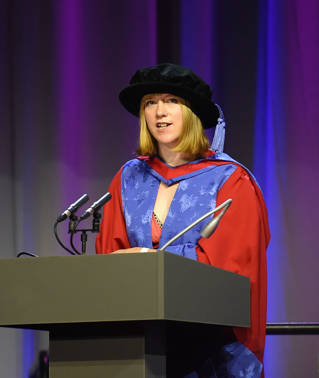 Becca Bland speaking at graduation