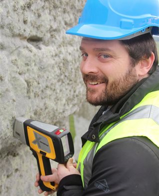 Dr Jake Ciborowski working on a Sarsen