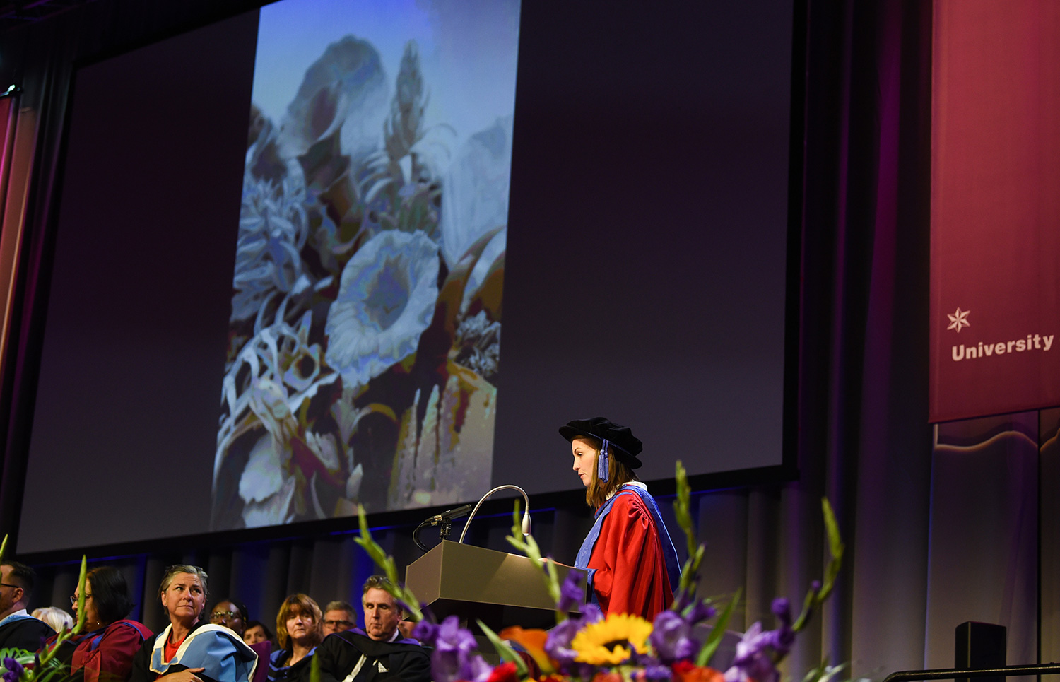 Phoebe Cummings receiving her Honorary Doctorate of Arts at the Brighton Centre