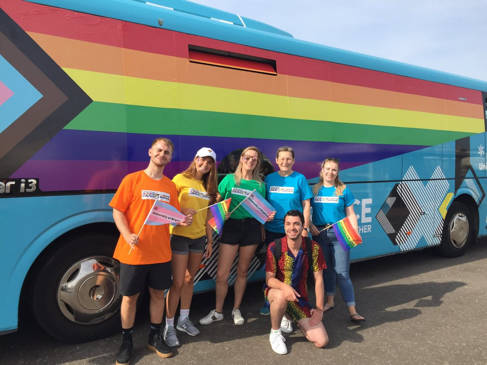 The university Pride bus with Debra Humphris and members of the Pride parade