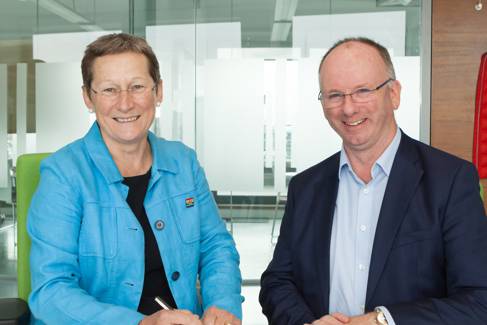 Vice-Chancellor Professor Debra Humphris signing the contract with Gerry Hughes of Gilbert-Ash