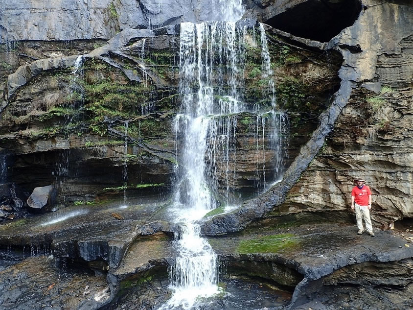 Professor Martin Smith at a clean waterfall