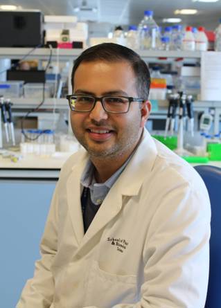 Professor Bhavik Patel in a laboratory