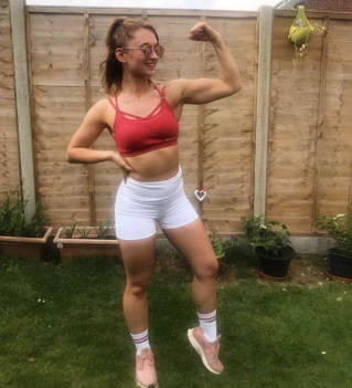 Jasmin Brown posing in garden
