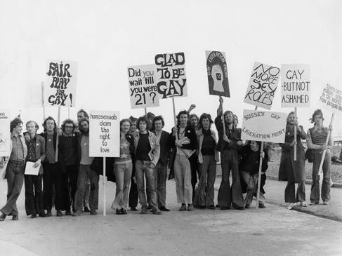 Sussex Gay Liberation Front holding placards on Brighton seafront in 1972