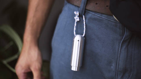 Soapstone dispenser hanging from a belt loop on some trousers