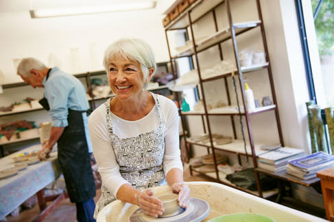 Student making pottery at a School of Art Summer School