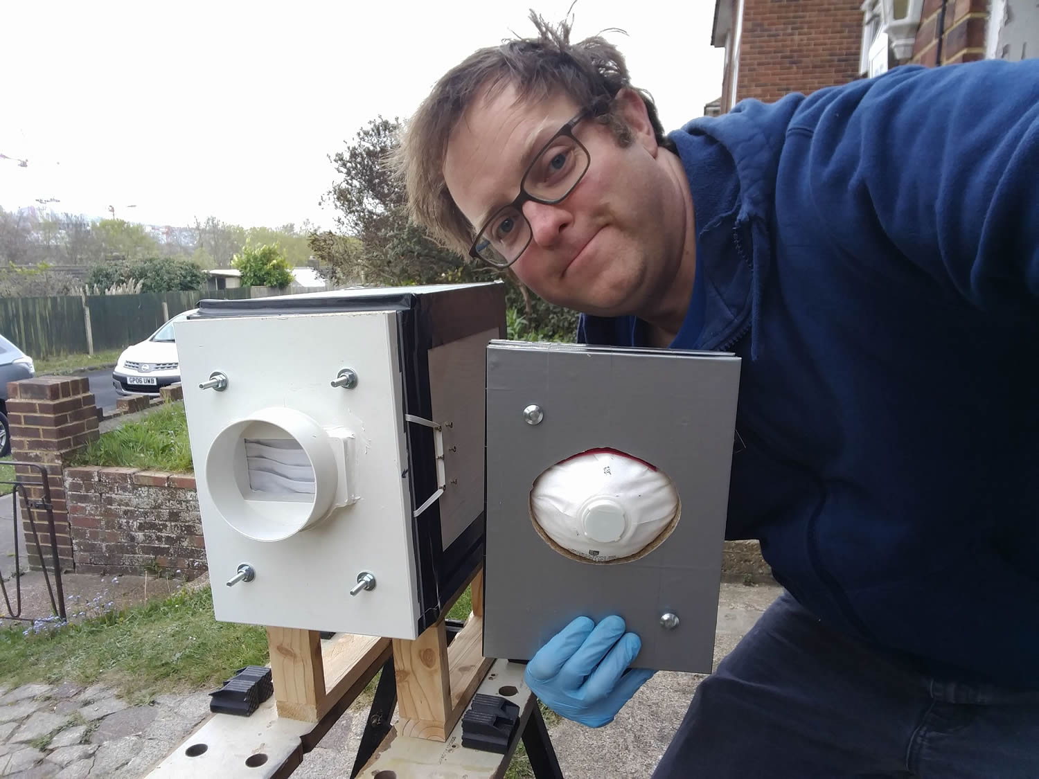 Dr Nicolas Miche working on the rig in his front garden
