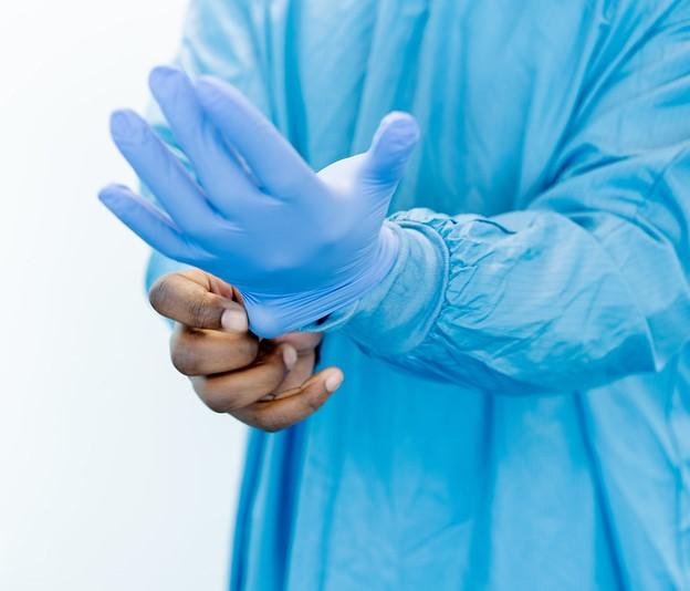 PPE gown and gloves copyright ECDC Flickr cc