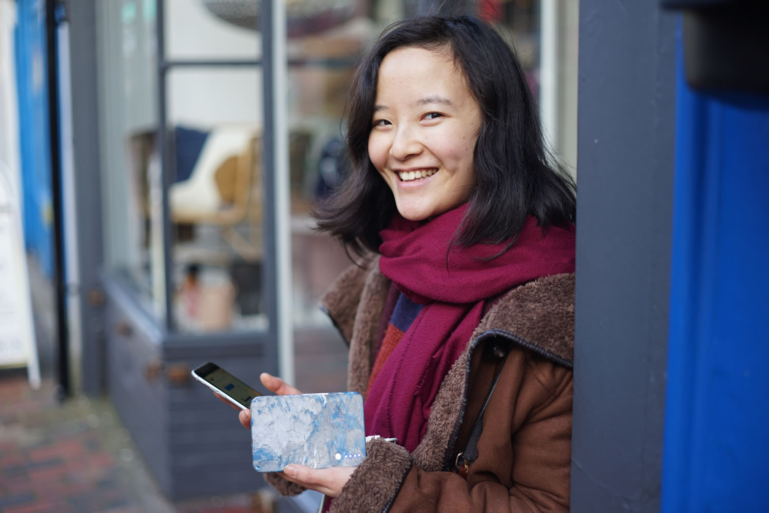 Tobie Tse testing out one of the first Gomi Portable Chargers in Brighton