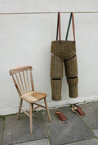 Willow trousers hanging up next to a chair