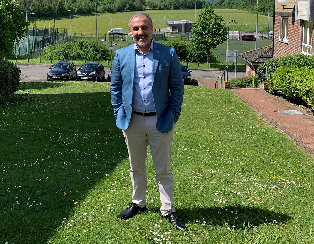 Ambassador Yama Yari with green fields in the background