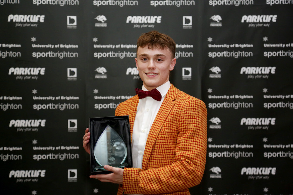 Ben Hickling picking up a Sport Brighton award at University of Brighton