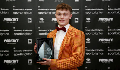 Ben Hickling picking up a Sport Brighton award at University of Brighton