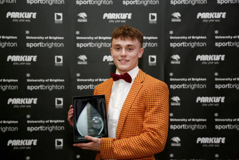 Ben Hickling picking up a Sport Brighton award at the University of Brighton