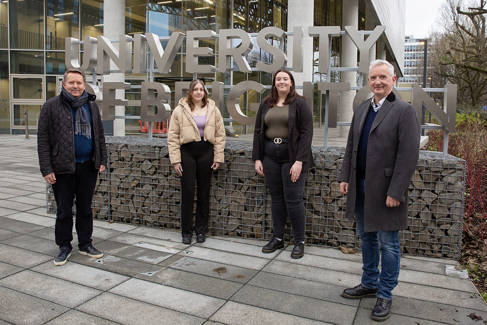 Loren May Waddon and Alana Frawley, flanked by Robert Williams and Alan Larkin from Family Law Partners