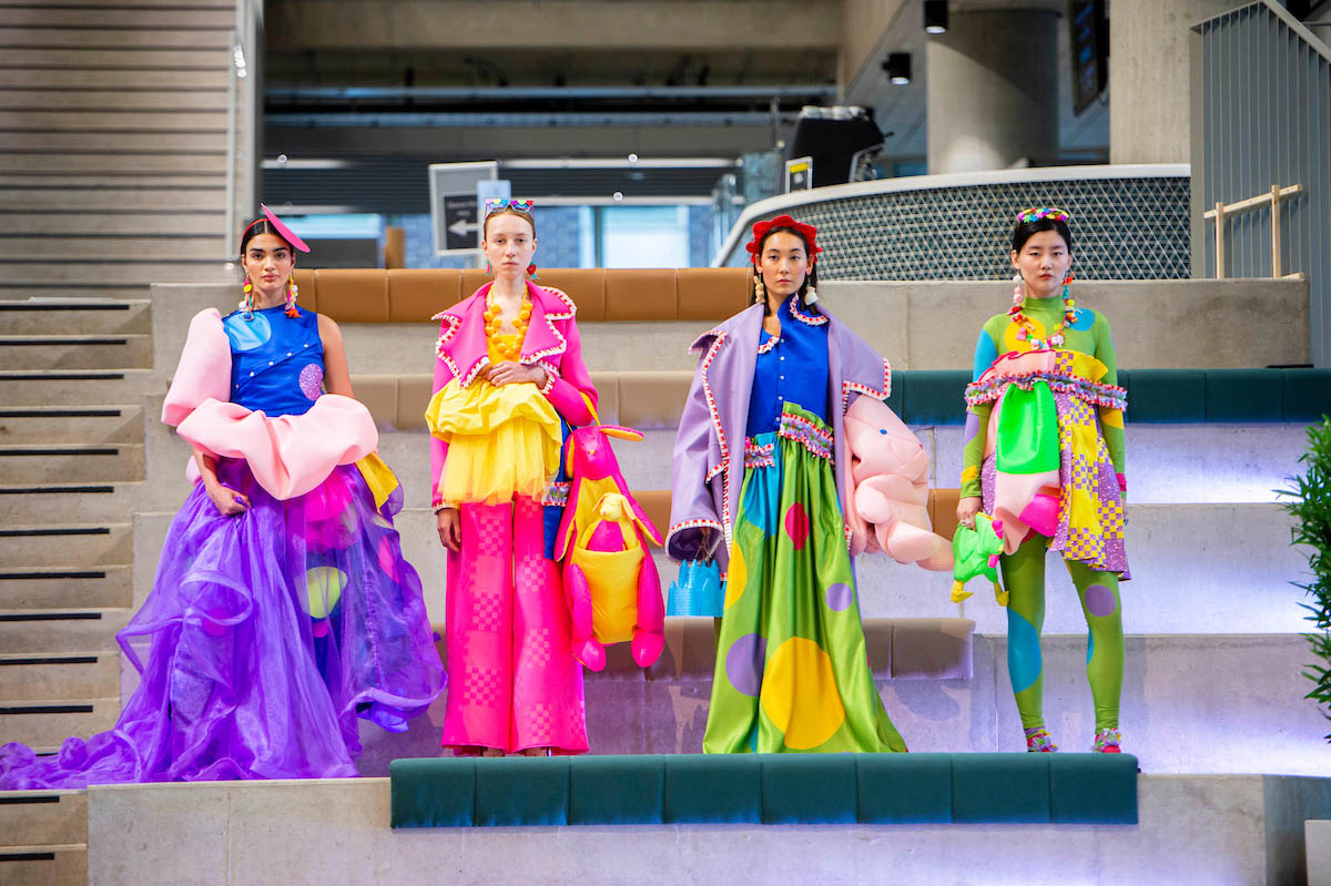 Four models wearing bright clothes by Lottie Allen