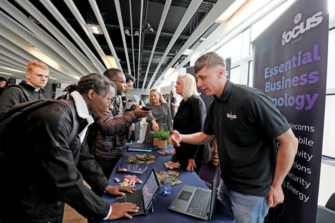 Student at Focus Group stand