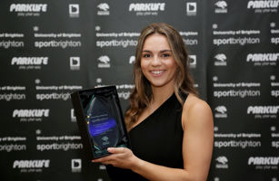 Graihagh Guille picking up 2022 University of Brighton Sports Award for shooting