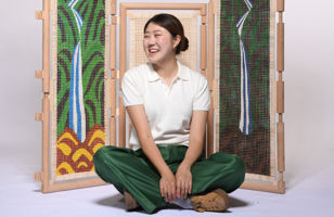 Jiin Kim, University of Brighton Craft MA student with her Korean-inspired wooden screen