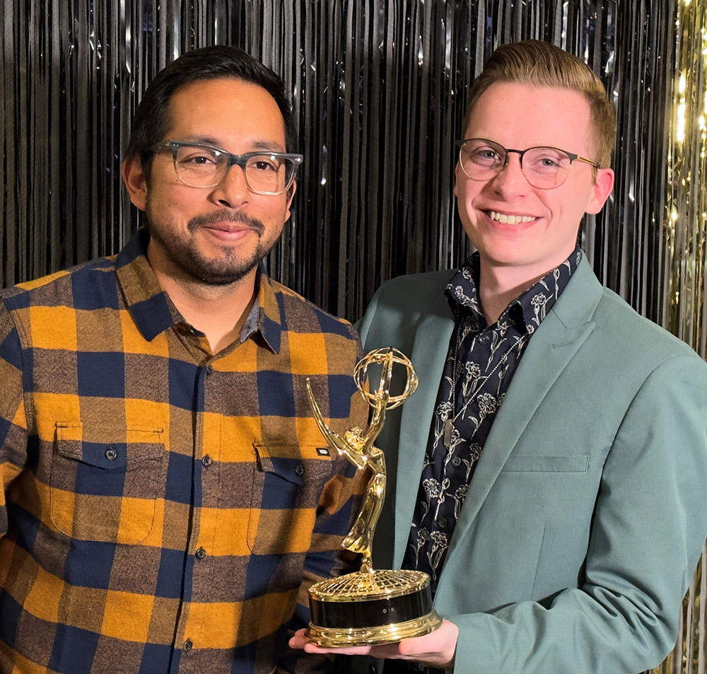 Jordan Hogan - on right - with Emmy Award, sharing the moment with photographer and editor colleague Manuel Rodriguez