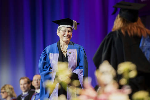 Professor Debra Humphris CBE on stage at graduation