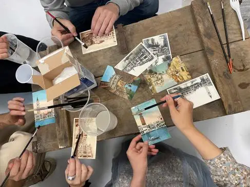 People using postcards and salt water at a workshop