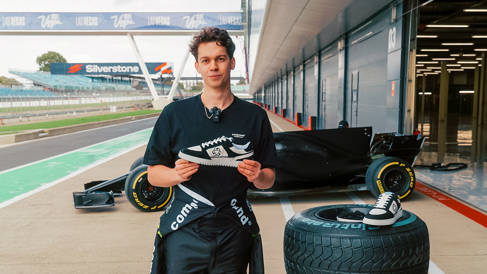 Alex Witty, founder of Compound Footwear, with his sustainable sneakers made from recycled motorsport tyres