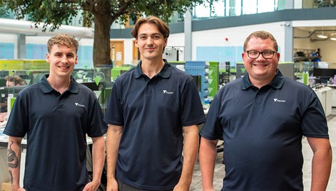 Max Lewandowski, James Napp, and Alex Moreton in matching polo shirts