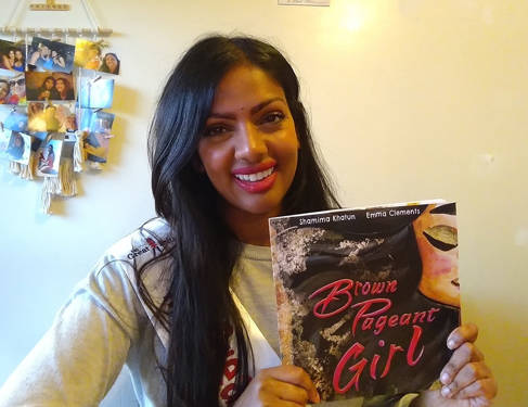 University of Brighton teaching student Shamima Khatun with copy of Brown Pageant Girl, one of her two published children's books