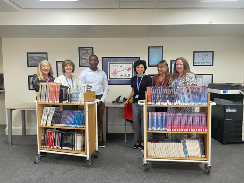 Queenwood Library librarians and graduate Desmond Macauley
