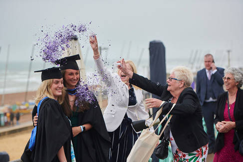 Graduation students on the beach