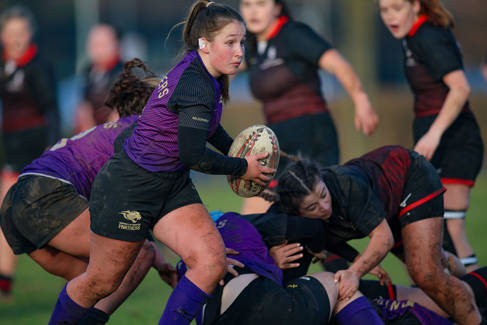 Samm Hart playing rugby