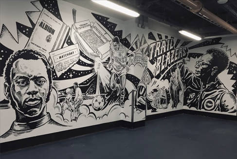 A black and white football mural