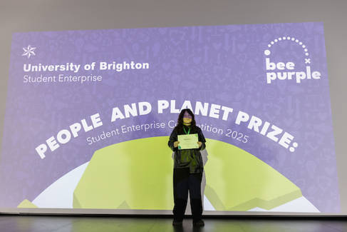 Amelia Jones with award