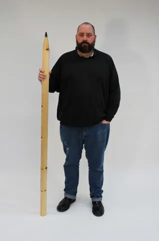 Chris Hamer portrait with giant pencil
