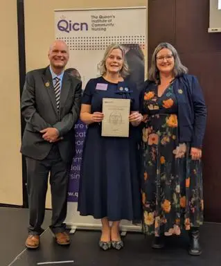 Professor John Unsworth, QICN Chair (left) Emily Leon and Steph Lawrence, CEO of the QICN (right)