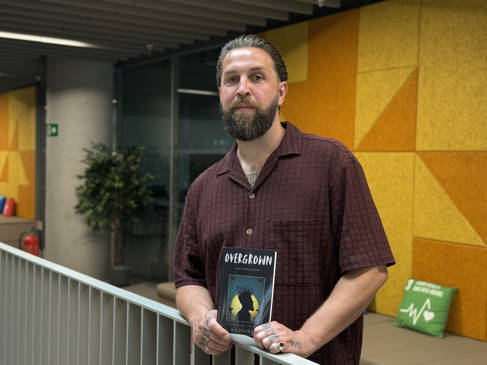 Will with his book