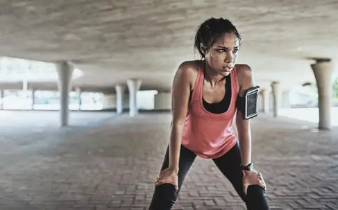 Woman looking fatigued after exercising