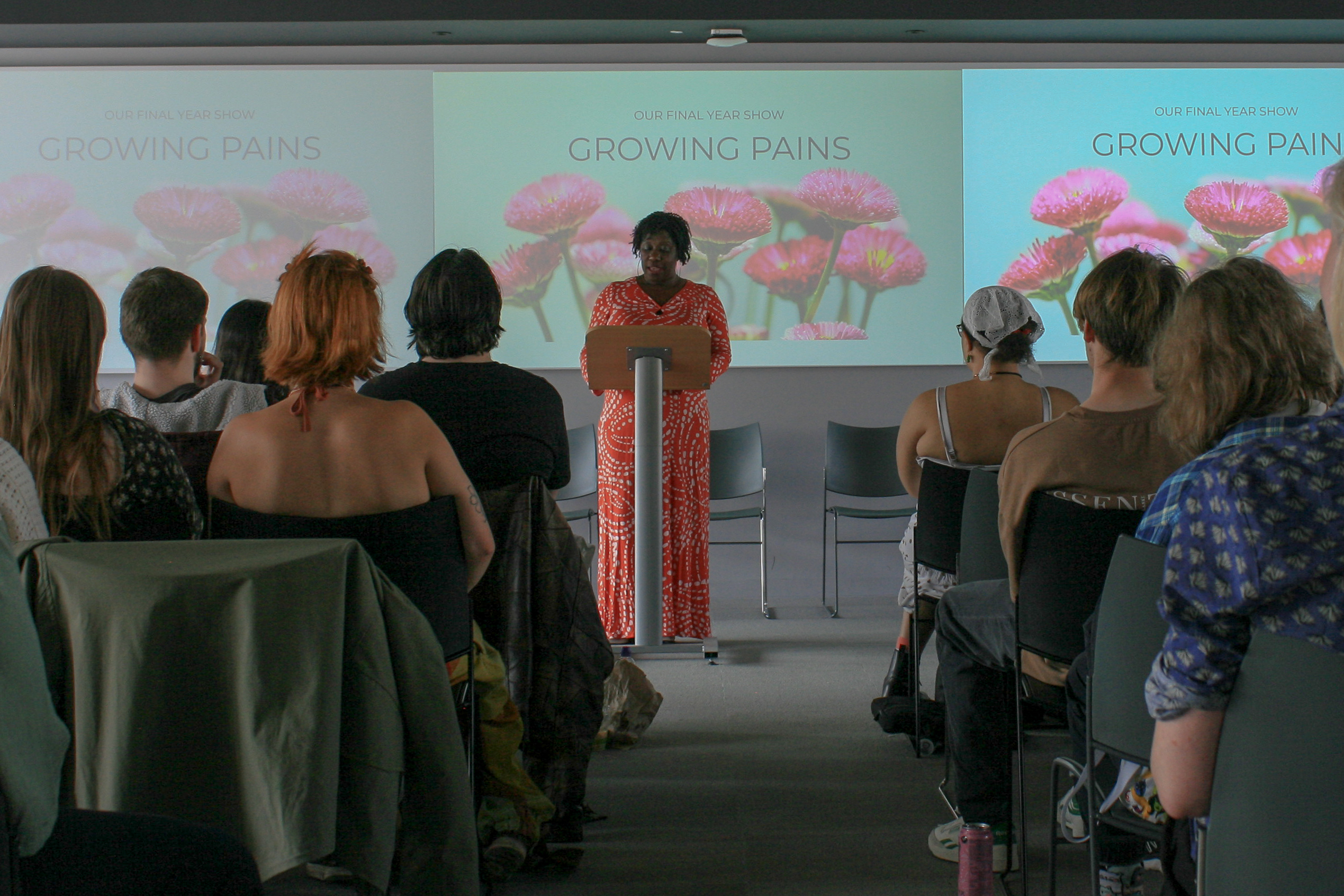 Author Dorothy Koomson giving a speech in front of a seated audience