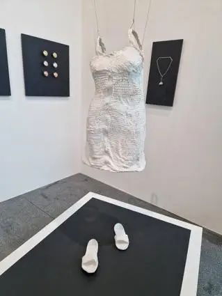 A paper mache lace dress and shoes