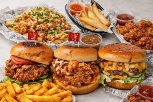 Burgers, chicken wings, chips, and filo parcels