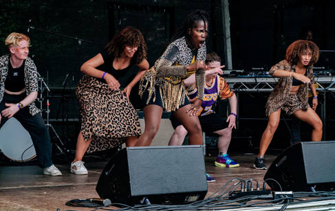 People dancing on stage at BARCO festival
