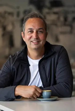 Kyriakos Baxevanis smiles at the camera