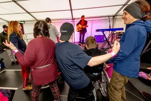 People dancing to a live band