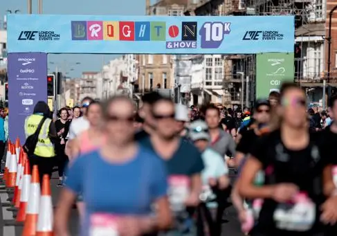 Runners racing at Brighton Marathon Weekend