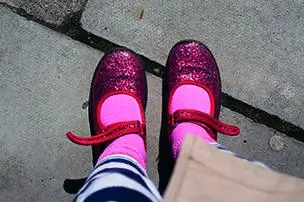 Child's red sparkly shoes